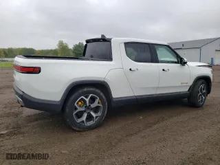 2022 Rivian R1T Adventure Package with VIN 7FCTGAAA8NN012505, listed as a Copart auction lot 72496734 with 5,916 mi miles and Salvage Title. Bid and sale history available at carsss.com. Image 3.
