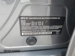 2015 BMW 5 Series 528i with VIN WBA5A5C52FD514549, listed as a IAAI auction lot 41812177 with 107,819 mi miles. Bid and sale history available at carsss.com. Image 9.