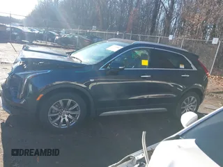 2022 Cadillac XT4 AWD Premium Luxury with VIN 1GYFZDR40NF139931, listed as a IAAI auction lot 41168482 with 28,748 mi miles and . Bid and sale history available at carsss.com. Image 14.