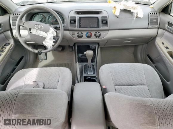 2003 Toyota Camry LE z VIN 4T1BF32K13U554339, wystawiony jako Copart lot #55972595 z przebiegiem 69 549 mil mil oraz Szkoda całkowita • Salvage title. Historia ofert i sprzedaży dostępna na DreamBid. Obrazek 8.