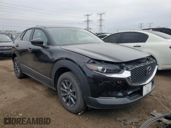 2023 Mazda CX-30 S with VIN 3MVDMBAM6PM549095, listed as a Copart auction lot 53027665 with 53,804 mi miles and Salvage title. Bid and sale history available at DreamBid. Image 4.
