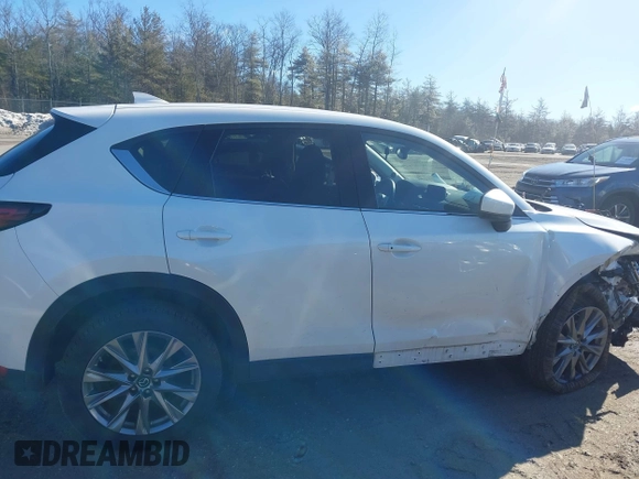2019 Mazda CX-5 Grand Touring with VIN JM3KFBDM2K0672720, listed as a IAAI auction lot 41751196 with 51,632 mi miles and . Bid and sale history available at carsss.com. Image 13.