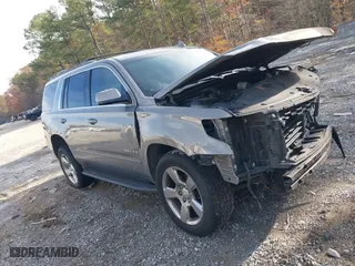 2017 Chevrolet Tahoe LS with VIN 1GNSCAKC7HR179715, listed as a IAAI auction lot 40948996 with 164,178 mi miles. Bid and sale history available at carsss.com. Image 1.