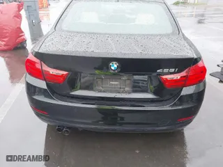 2015 BMW 4 Series 428i with VIN WBA3N7C57FK222351, listed as a IAAI auction lot 41490737 with 99,322 mi miles. Bid and sale history available at carsss.com. Image 16.