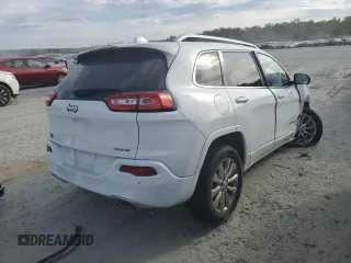 2018 Jeep Cherokee Overland with VIN 1C4PJMJX9JD594323, listed as a Copart auction lot 76238794 with 71,870 mi miles and Salvage Title. Bid and sale history available at carsss.com. Image 3.