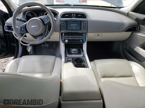 2017 Jaguar XE 35t Prestige with VIN SAJAK4BV2HA974312, listed as a Copart auction lot 51285455 with 99,910 mi miles and Salvage Title. Bid and sale history available at DreamBid. Image 8.
