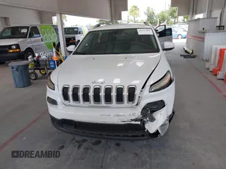 2016 Jeep Cherokee Latitude z VIN 1C4PJMCB5GW296303, wystawiony jako IAAI lot #42135490 z przebiegiem 136 503 mil mil oraz . Historia ofert i sprzedaży dostępna na DreamBid. Obrazek 12.