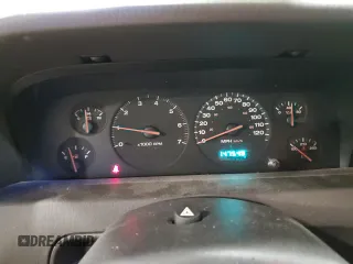 2000 Jeep Grand Cherokee Laredo with VIN 1J4GW48S2YC256123, listed as a Copart auction lot 56015855 with 147,549 mi miles and Salvage title. Bid and sale history available at DreamBid. Image 9.
