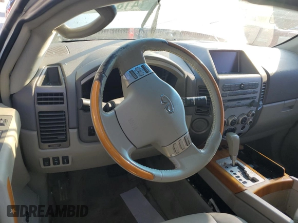 2006 Infiniti QX56 z VIN 5N3AA08A76N810044, wystawiony jako Copart lot #74182384 z przebiegiem Nie podano mil oraz Szkoda całkowita • Salvage title. Historia ofert i sprzedaży dostępna na DreamBid. Obrazek 9.