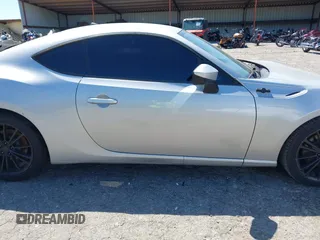 2014 Scion FR-S z VIN JF1ZNAA11E8704311, wystawiony jako IAAI lot #42004779 z przebiegiem 161 094 mil mil oraz . Historia ofert i sprzedaży dostępna na DreamBid. Obrazek 13.
