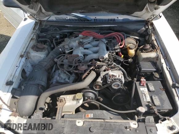 2003 Ford Mustang Standard z VIN 1FAFP40423F337129, wystawiony jako Copart lot #58982005 z przebiegiem 196 277 mil mil oraz Szkoda całkowita • Salvage title. Historia ofert i sprzedaży dostępna na DreamBid. Obrazek 11.
