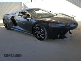 2022 McLaren GT z VIN SBM22GCA4NW001602, wystawiony jako Copart lot #83270334 z przebiegiem 33 668 mil mil oraz Tytuł czysty. Historia ofert i sprzedaży dostępna na DreamBid. Obrazek 4.