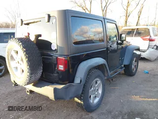 2011 Jeep Wrangler Rubicon with VIN 1J4HA6D11BL564211, listed as a IAAI auction lot 41242240 with 124,039 mi miles and . Bid and sale history available at carsss.com. Image 4.