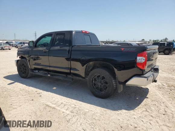 2016 Toyota Tundra SR with VIN 5TFRM5F13GX103858, listed as a Copart auction lot 52448315 with 126,418 mi miles and Salvage title. Bid and sale history available at DreamBid. Image 2.