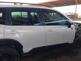 2022 Subaru Forester Wilderness with VIN JF2SKAMC3NH401355, listed as a IAAI auction lot 42510482 with 58,279 mi miles and . Bid and sale history available at DreamBid. Image 14.