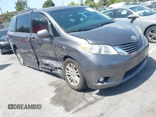2014 Toyota Sienna XLE with VIN 5TDYK3DC8ES450681, listed as a IAAI auction lot 41962874 with 81,871 mi miles and . Bid and sale history available at DreamBid. Image 1.