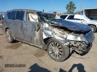 2011 Infiniti QX56 8-passenger z VIN JN8AZ2NC0B9301119, wystawiony jako IAAI lot #41156741 z przebiegiem 130 944 mil mil oraz . Historia ofert i sprzedaży dostępna na DreamBid. Obrazek 1.