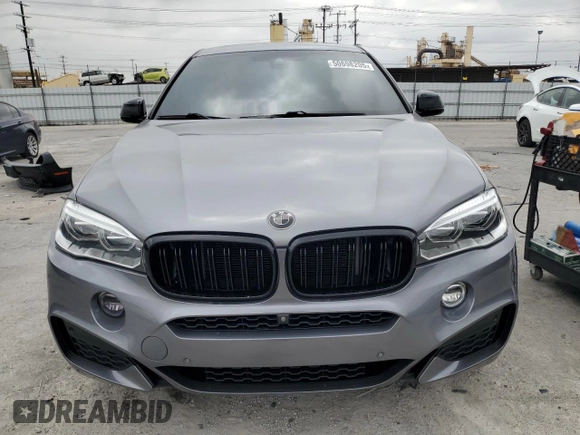 2018 BMW X6 sDrive35i with VIN 5UXKU0C52J0G81057, listed as a Copart auction lot 50698205 with 67,735 mi miles and Salvage Title. Bid and sale history available at carsss.com. Image 5.