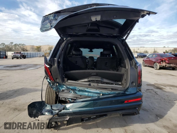 2024 Cadillac XT6 AWD Sport with VIN 1GYKPGRS2RZ753923, listed as a Copart auction lot 42375635 with 9,437 mi miles and Salvage Title. Bid and sale history available at carsss.com. Image 6.