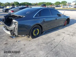 2015 Audi S8 z VIN WAUK2AFD5FN021986, wystawiony jako IAAI lot #41986491 z przebiegiem 142 073 mil mil oraz . Historia ofert i sprzedaży dostępna na DreamBid. Obrazek 4.