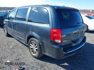 2014 Dodge Grand Caravan SXT with VIN 2C4RDGCG3ER339491, listed as a IAAI auction lot 41744826 with 146,757 mi miles and . Bid and sale history available at DreamBid. Image 3.