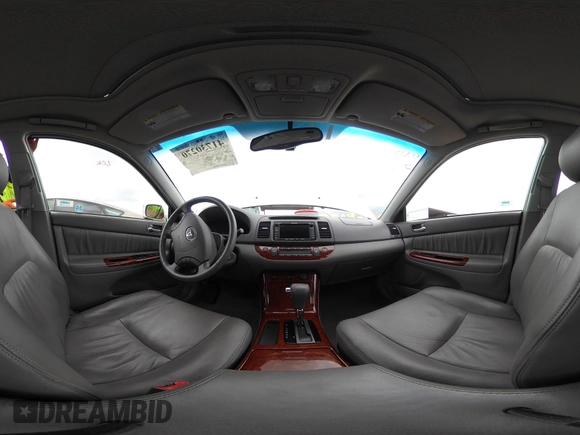 2005 Toyota Camry LE with VIN JTDBF30K650163057, listed as a IAAI auction lot 41730270 with 98,300 mi miles and . Bid and sale history available at DreamBid. Image 18.