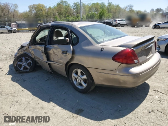 2003 Ford Taurus SEL Deluxe with VIN 1FAHP56SX3G199970, listed as a Copart auction lot 53042795 with 212,802 mi miles and Salvage Title. Bid and sale history available at DreamBid. Image 2.