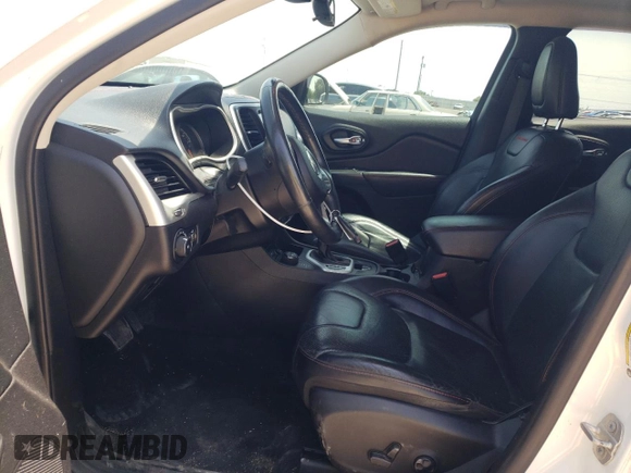 2016 Jeep Cherokee Trailhawk with VIN 1C4PJMBS3GW102000, listed as a Copart auction lot 60866505 with 120,985 mi miles and Salvage title. Bid and sale history available at DreamBid. Image 7.
