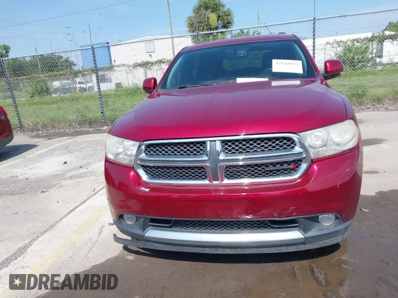 2013 Dodge Durango Crew z VIN 1C4RDJDG6DC672934, wystawiony jako IAAI lot #42542073 z przebiegiem 181 812 mil mil oraz . Historia ofert i sprzedaży dostępna na DreamBid. Obrazek 12.