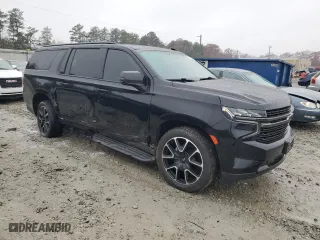 2021 Chevrolet Suburban RST with VIN 1GNSKEKD4MR210450, listed as a Copart auction lot 84372054 with 98,560 mi miles and Salvage Title. Bid and sale history available at carsss.com. Image 4.