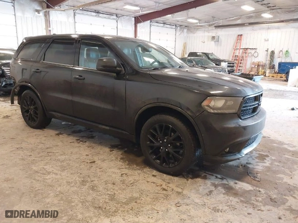 2015 Dodge Durango SXT with VIN 1C4RDJAG4FC133168, listed as a IAAI auction lot 41524022 with 142,881 mi miles. Bid and sale history available at carsss.com. Image 1.