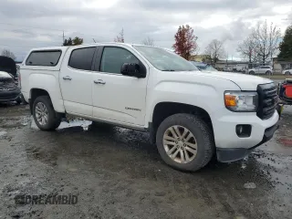 2016 GMC Canyon 4WD SLT with VIN 1GTP6DE11G1266217, listed as a Copart auction lot 82195694 with 129,578 mi miles and Clean Title. Bid and sale history available at carsss.com. Image 4.