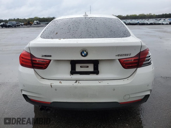 2016 BMW 4 Series 428i xDrive with VIN WBA4C9C58GG136718, listed as a Copart auction lot 55225815 with 169,356 mi miles and Salvage title. Bid and sale history available at DreamBid. Image 6.