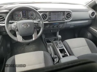2023 Toyota Tacoma SR with VIN 3TMCZ5AN2PM577873, listed as a Copart auction lot 57361315 with 50,110 mi miles and Salvage title. Bid and sale history available at DreamBid. Image 8.