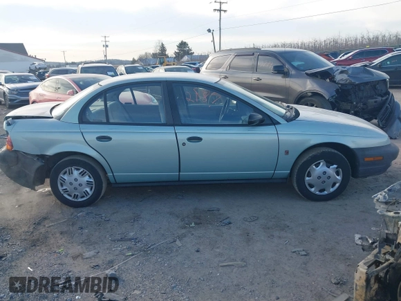 1997 Saturn SL with VIN 1G8ZH528XVZ196784, listed as a IAAI auction lot 41662187 with 112,278 mi miles. Bid and sale history available at carsss.com. Image 13.