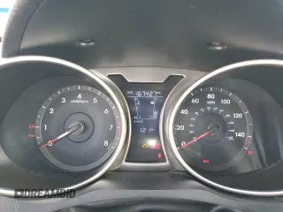 2012 Hyundai Veloster w/Gray Int z VIN KMHTC6AD1CU066882, wystawiony jako Copart lot #55781745 z przebiegiem 167 427 mil mil oraz Czysty tytuł • Clean title. Historia ofert i sprzedaży dostępna na DreamBid. Obrazek 9.