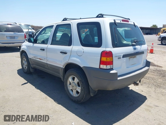 2001 Ford Escape XLS with VIN 1FMYU021X1KA59670, listed as a IAAI auction lot 42551801 with 189,058 mi miles and . Bid and sale history available at DreamBid. Image 3.