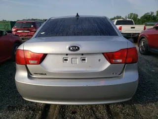 2009 Kia Optima LX z VIN KNAGE228195332931, wystawiony jako Copart lot #55279665 z przebiegiem 295 523 mil mil oraz Szkoda całkowita • Salvage title. Historia ofert i sprzedaży dostępna na DreamBid. Obrazek 6.