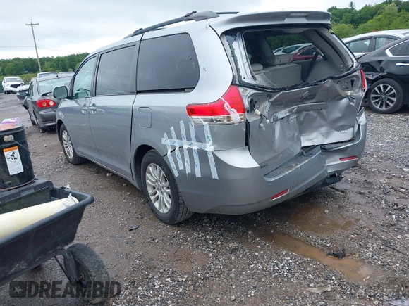 2012 Toyota Sienna XLE AAS with VIN 5TDYK3DC2CS205856, listed as a IAAI auction lot 42230009 with 136,588 mi miles and . Bid and sale history available at DreamBid. Image 3.