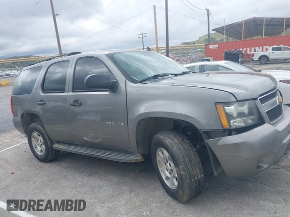 2007 Chevrolet Tahoe LT z VIN 1GNFC13J07J122414, wystawiony jako IAAI lot #39134539 z przebiegiem Nie podano mil oraz . Historia ofert i sprzedaży dostępna na DreamBid. Obrazek 12.
