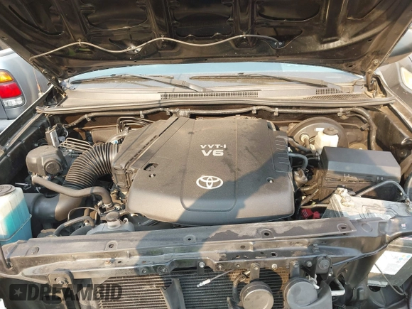 2013 Toyota Tacoma PreRunner z VIN 3TMJU4GN0DM143065, wystawiony jako IAAI lot #41231861 z przebiegiem 139 156 mil mil oraz . Historia ofert i sprzedaży dostępna na DreamBid. Obrazek 10.