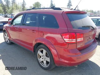 2010 Dodge Journey SXT with VIN 3D4PH5FV5AT135831, listed as a IAAI auction lot 42175106 with 164,030 mi miles and . Bid and sale history available at carsss.com. Image 3.