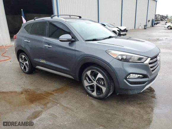 2017 Hyundai Tucson Value with VIN KM8J33A22HU367754, listed as a Copart auction lot 42009495 with 55,477 mi miles and Salvage Title. Bid and sale history available at carsss.com. Image 4.
