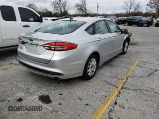 2017 Ford Fusion S with VIN 3FA6P0G77HR273995, listed as a Copart auction lot 82822813 with 113,568 mi miles and Non Repairable. Bid and sale history available at DreamBid. Image 4.