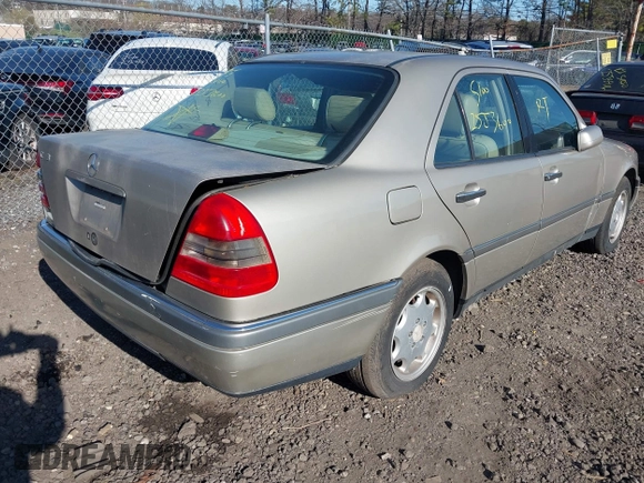 1997 Mercedes-Benz C with VIN WDBHA23E6VF506602, listed as a IAAI auction lot 42042704 with Not provided miles and . Bid and sale history available at DreamBid. Image 4.
