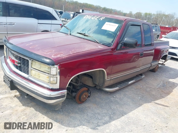 1994 GMC Sierra 1500 z VIN 2GTEK19K4R1561409, wystawiony jako IAAI lot #41903157 z przebiegiem 416 719 mil mil oraz . Historia ofert i sprzedaży dostępna na DreamBid. Obrazek 2.