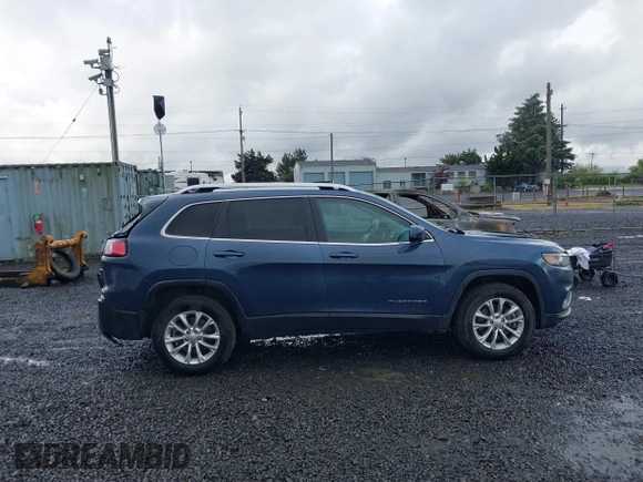 2019 Jeep Cherokee Latitude z VIN 1C4PJMCX2KD369871, wystawiony jako IAAI lot #42239476 z przebiegiem 88 261 mil mil oraz . Historia ofert i sprzedaży dostępna na DreamBid. Obrazek 13.