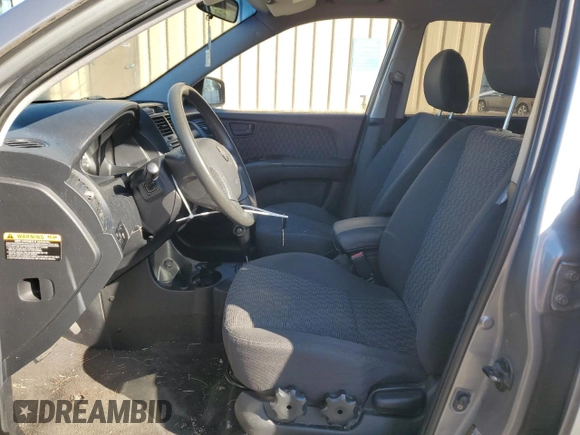 2006 Kia Sportage LX z VIN KNDJF724467197542, wystawiony jako Copart lot #75233464 z przebiegiem 204 570 mil mil oraz Czysty tytuł • Clean title. Historia ofert i sprzedaży dostępna na DreamBid. Obrazek 7.