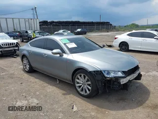 2013 Audi A7 Premium Plus z VIN WAUYGAFCXDN040582, wystawiony jako IAAI lot #42634757 z przebiegiem 165 356 mil mil oraz . Historia ofert i sprzedaży dostępna na DreamBid. Obrazek 1.