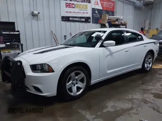 2012 Dodge Charger Police with VIN 2C3CDXAG1CH304612, listed as a IAAI auction lot 41555187 with 183,121 mi miles. Bid and sale history available at carsss.com. Image 2.